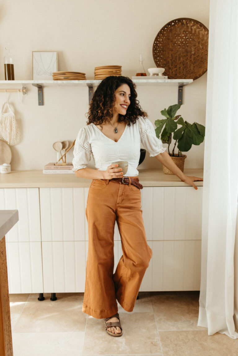 woman drinking coffee at coffee station 865x1296