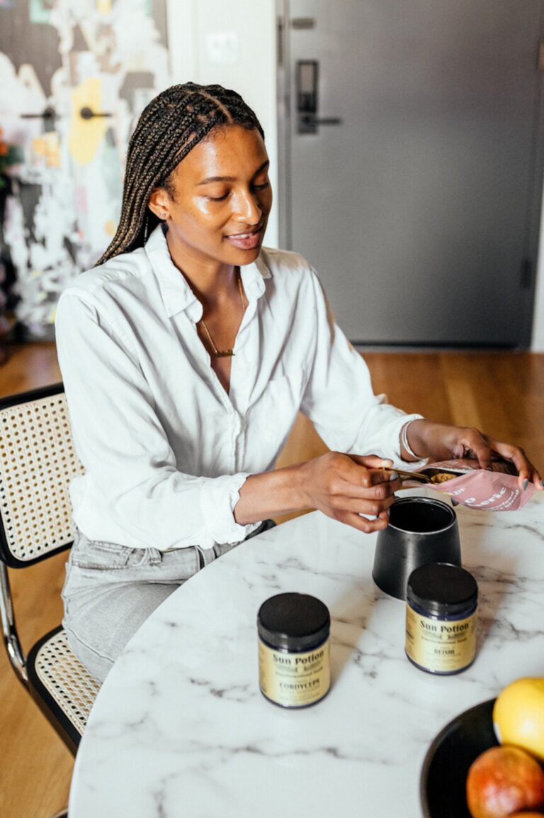 woman portioning supplements