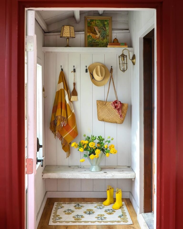 mudroom bench hooks paneled walls cottage style